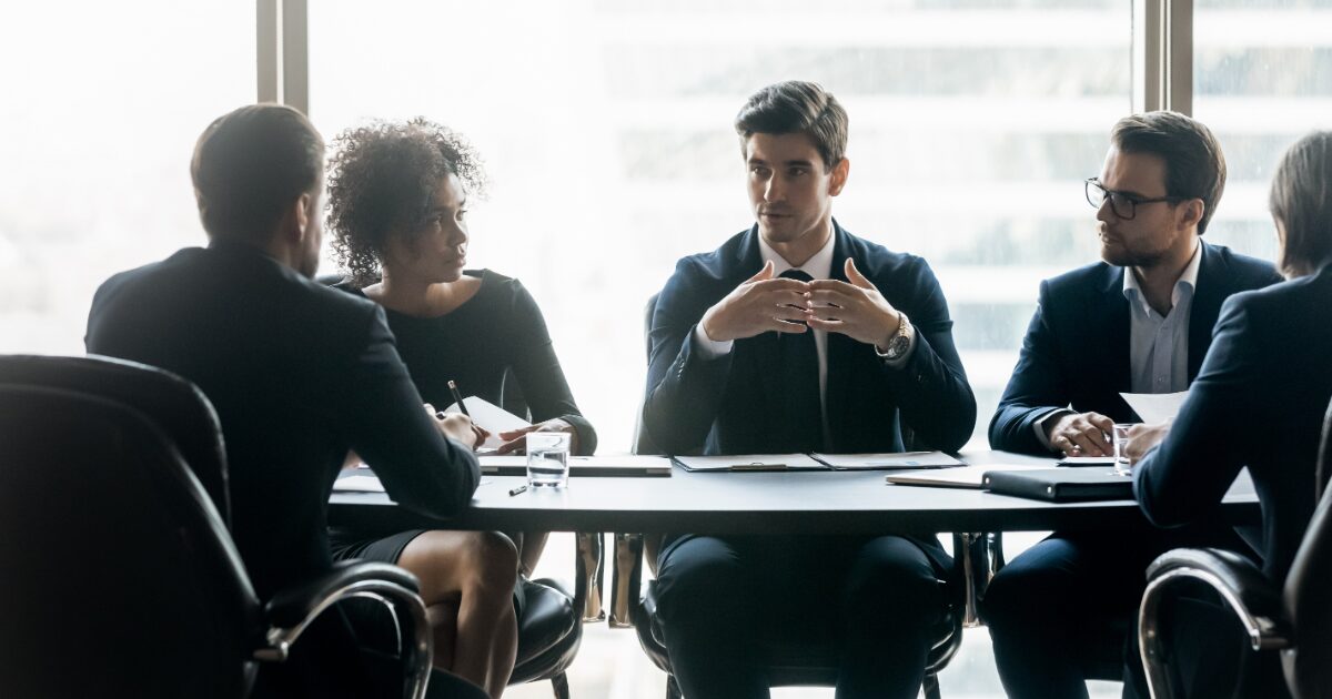 Business leaders discussing strategy and tradeoffs related to an on-premise contact center platform